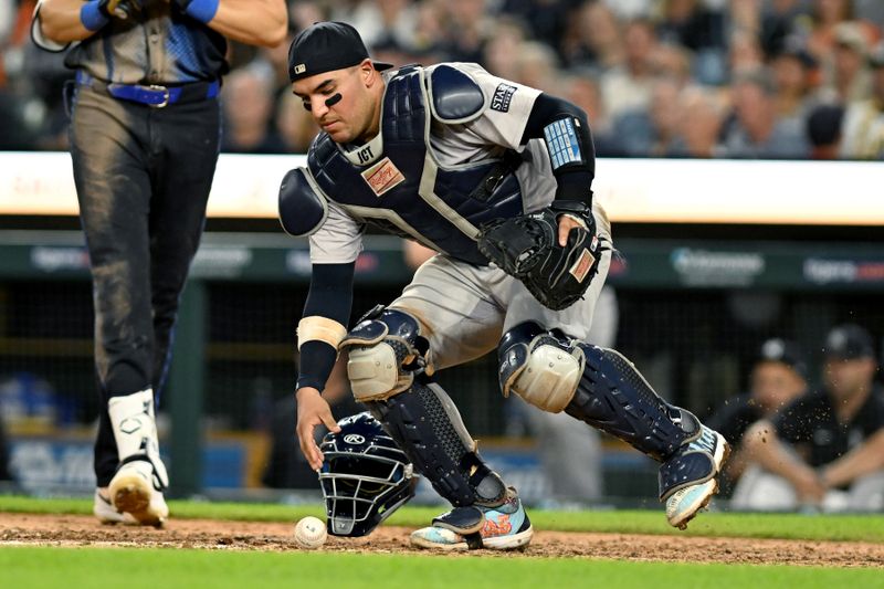 Aug 16, 2024; Detroit, Michigan, USA;  New York Yankees catcher Jose Trevino (39) chases down a pitch that got away from him against the Detroit Tigers in the sixth inning at Comerica Park. Mandatory Credit: Lon Horwedel-USA TODAY Sports