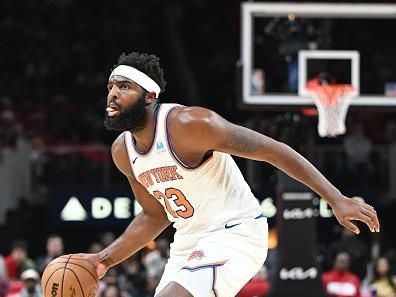 ATLANTA, GA - OCTOBER 27: Mitchell Robinson #23 of the New York Knicks dribbles the ball during the game against the Atlanta Hawks on October 27, 2023 at State Farm Arena in Atlanta, Georgia.  NOTE TO USER: User expressly acknowledges and agrees that, by downloading and/or using this Photograph, user is consenting to the terms and conditions of the Getty Images License Agreement. Mandatory Copyright Notice: Copyright 2023 NBAE (Photo by Adam Hagy/NBAE via Getty Images)