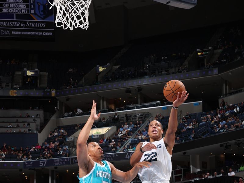 MEMPHIS, TN - OCTOBER 10: Desmond Bane #22 of the Memphis Grizzlies shoots the ball during the game against the Charlotte Hornets during a NBA Preseason game on October 10, 2024 at FedExForum in Memphis, Tennessee. NOTE TO USER: User expressly acknowledges and agrees that, by downloading and or using this photograph, User is consenting to the terms and conditions of the Getty Images License Agreement. Mandatory Copyright Notice: Copyright 2024 NBAE (Photo by Joe Murphy/NBAE via Getty Images)