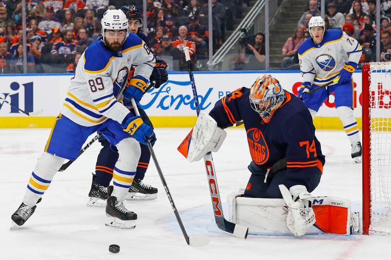 Mar 21, 2024; Edmonton, Alberta, CAN; Buffalo Sabres forward Alex Tuch (89) tries to get to a loose puck in front of Edmonton Oilers goaltender Stuart Skinner (74) during the second period at Rogers Place. Mandatory Credit: Perry Nelson-USA TODAY Sports