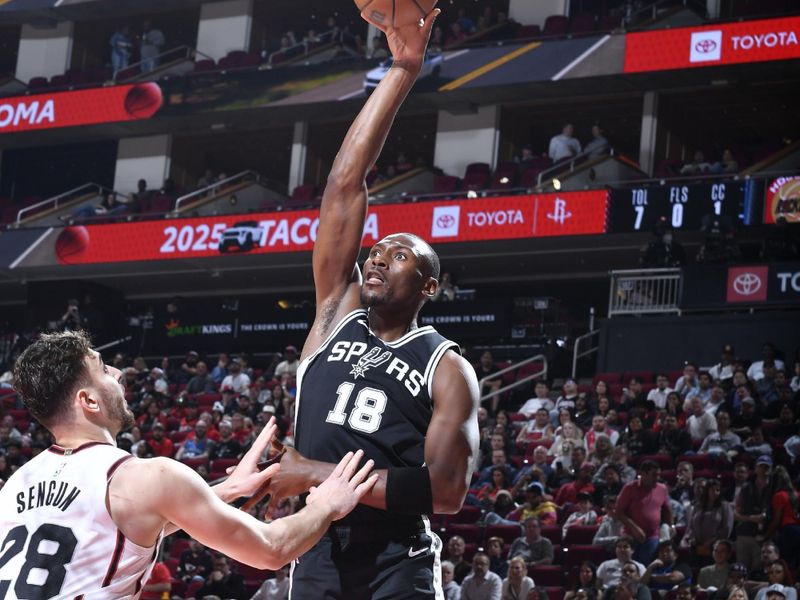 HOUSTON, TX - FEBRUARY 26:  Bismack Biyombo #18 of the San Antonio Spurs shoots the ball during the game against the Houston Rockets  on February 26, 2025 at the Toyota Center in Houston, Texas. NOTE TO USER: User expressly acknowledges and agrees that, by downloading and or using this photograph, User is consenting to the terms and conditions of the Getty Images License Agreement. Mandatory Copyright Notice: Copyright 2025 NBAE (Photo by Logan Riely/NBAE via Getty Images)