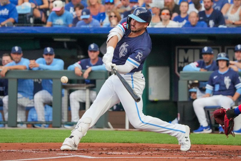 Jul 26, 2024; Kansas City, Missouri, USA; Kansas City Royals first baseman Vinnie Pasquantino (9) singles against the Chicago Cubs in the first inning at Kauffman Stadium. Mandatory Credit: Denny Medley-USA TODAY Sports