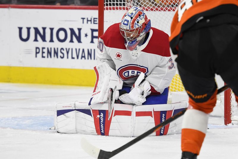 Oct 27, 2024; Philadelphia, Pennsylvania, USA; Montreal Canadiens goaltender Cayden Primeau (30) makes a save Philadelphia Flyers left wing Joel Farabee (86) during the second period at Wells Fargo Center. Mandatory Credit: Eric Hartline-Imagn Images