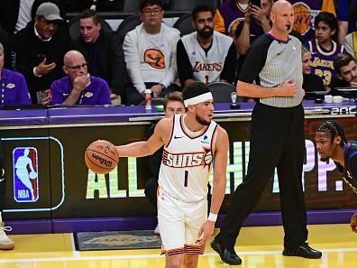 LOS ANGELES, CA - DECEMBER 5: Devin Booker #1 of the Phoenix Suns dribbles the ball during the game against the Los Angeles Lakers during the Quarterfinals of the In-Season Tournament on December 5, 2023 at Crypto.Com Arena in Los Angeles, California. NOTE TO USER: User expressly acknowledges and agrees that, by downloading and/or using this Photograph, user is consenting to the terms and conditions of the Getty Images License Agreement. Mandatory Copyright Notice: Copyright 2023 NBAE (Photo by Adam Pantozzi/NBAE via Getty Images)