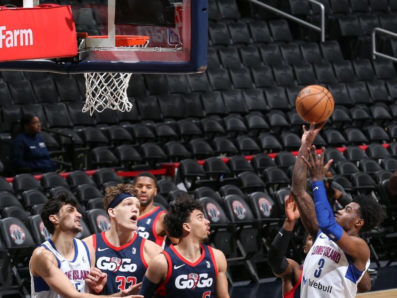 WASHINGTON, DC -? MARCH 8:  Davion Warren #3 of the Long Island Nets goes to the basket during the game against the Capital City Go-Go on March 8, 2024 at Capital One Arena in Washington, DC. NOTE TO USER: User expressly acknowledges and agrees that, by downloading and or using this Photograph, user is consenting to the terms and conditions of the Getty Images License Agreement. Mandatory Copyright Notice: Copyright 2024 NBAE (Photo by Stephen Gosling/NBAE via Getty Images)