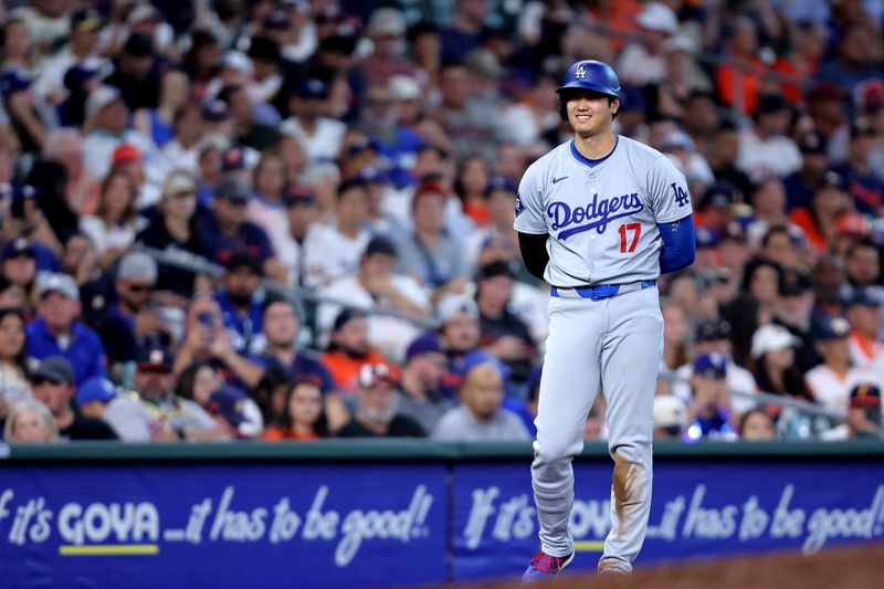 Jul 28, 2024; Houston, Texas, USA; Los Angeles Dodgers designated hitter Shohei Ohtani (17) stands on third base during the ninth inning against the Houston Astros at Minute Maid Park. Mandatory Credit: Erik Williams-USA TODAY Sports