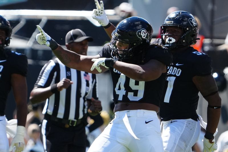 Sep 9, 2023; Boulder, Colorado, USA; Colorado Buffaloes defensive end Taijh Alston (49) celebrates his sack on Nebraska Cornhuskers quarterback Jeff Sims (7) (not pictured) in the third quarter at Folsom Field. Mandatory Credit: Ron Chenoy-USA TODAY Sports