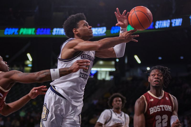 Jan 4, 2025; Atlanta, Georgia, USA; Boston College Eagles guard Fred Payne (5) forces Georgia Tech Yellow Jackets guard Jaeden Mustaf (3) to lose the ball in the second half at McCamish Pavilion. Mandatory Credit: Brett Davis-Imagn Images