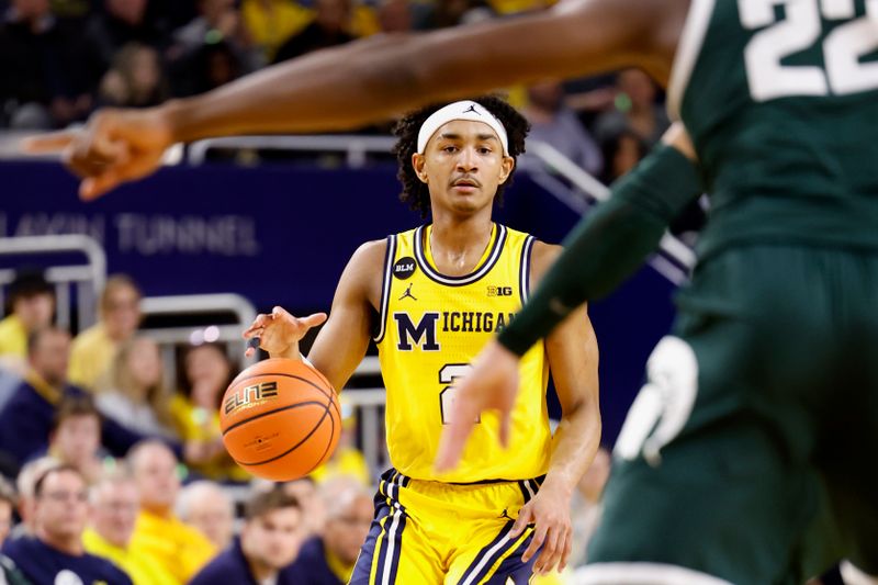 Feb 18, 2023; Ann Arbor, Michigan, USA;  Michigan Wolverines guard Kobe Bufkin (2) dribbles the ball against the Michigan State Spartans in the first half at Crisler Center. Mandatory Credit: Rick Osentoski-USA TODAY Sports