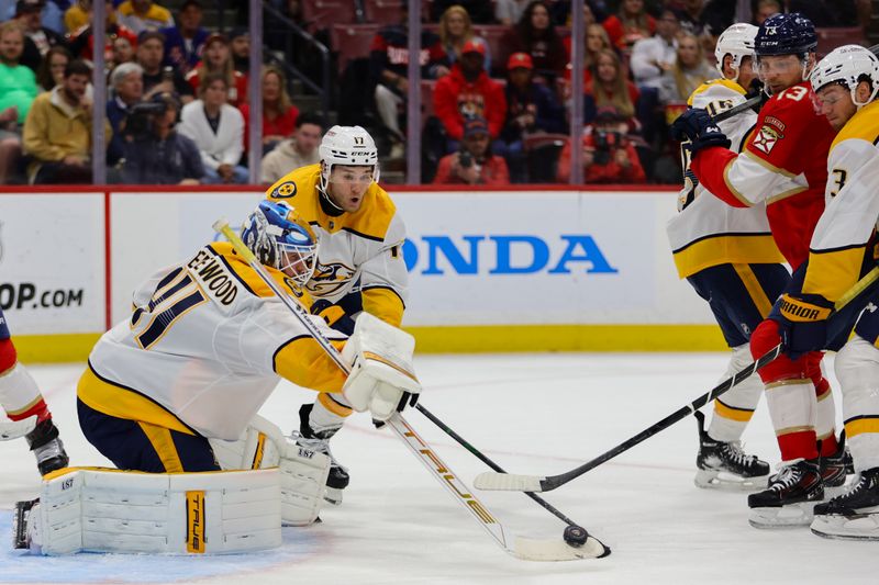 Nov 7, 2024; Sunrise, Florida, USA; Nashville Predators goaltender Scott Wedgewood (41) makes a save against the Florida Panthers during the second period at Amerant Bank Arena. Mandatory Credit: Sam Navarro-Imagn Images