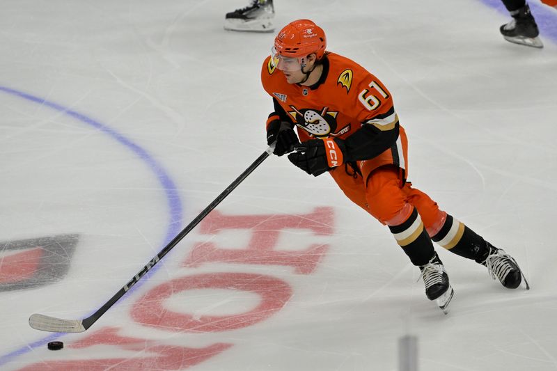 Nov 3, 2024; Anaheim, California, USA;  Anaheim Ducks left wing Cutter Gauthier (61) handles the puck in the second period against the Chicago Blackhawks at Honda Center. Mandatory Credit: Jayne Kamin-Oncea-Imagn Images