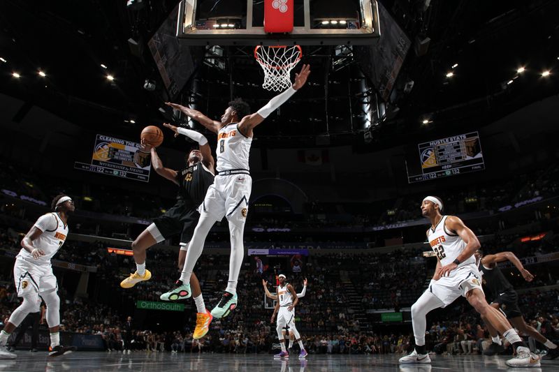 MEMPHIS, TN - APRIL 14:  GG Jackson #45 of the Memphis Grizzlies drives to the basket during the game against the Denver Nuggets on April 14, 2024 at FedExForum in Memphis, Tennessee. NOTE TO USER: User expressly acknowledges and agrees that, by downloading and or using this photograph, User is consenting to the terms and conditions of the Getty Images License Agreement. Mandatory Copyright Notice: Copyright 2024 NBAE (Photo by Joe Murphy/NBAE via Getty Images)