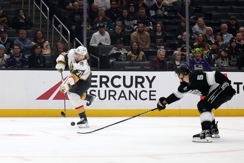 Oct 30, 2024; Los Angeles, California, USA;  Vegas Golden Knights center William Karlsson (71) shoots the puck against Los Angeles Kings defenseman Andreas Englund (5) during the first period at Crypto.com Arena. Mandatory Credit: Kiyoshi Mio-Imagn Images