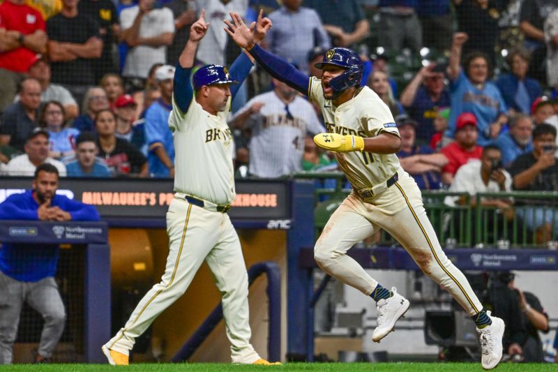 Sep 18, 2024; Milwaukee, Wisconsin, USA; Milwaukee Brewers left fielder Jackson Chourio (11) reacts after scoring the winning run in the ninth inning against the Philadelphia Phillies at American Family Field. Mandatory Credit: Benny Sieu-Imagn Images