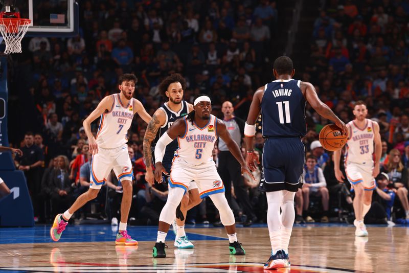 OKLAHOMA CITY, OK - MARCH 14: Luguentz Dort #5 of the Oklahoma City Thunder plays defense against the Dallas Mavericks on March 13, 2024 at Paycom Arena in Oklahoma City, Oklahoma. NOTE TO USER: User expressly acknowledges and agrees that, by downloading and or using this photograph, User is consenting to the terms and conditions of the Getty Images License Agreement. Mandatory Copyright Notice: Copyright 2024 NBAE (Photo by Zach Beeker/NBAE via Getty Images)