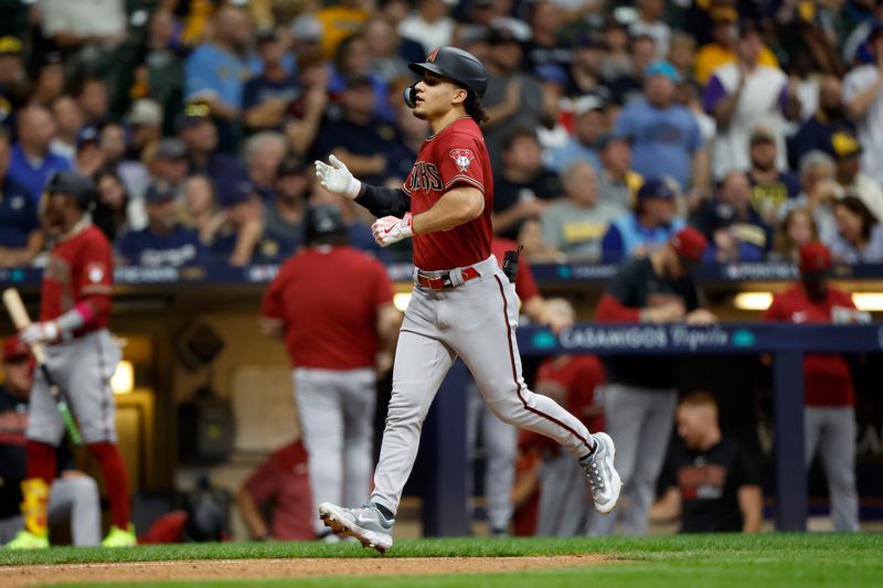 Oct 4, 2023; Milwaukee, Wisconsin, USA; Arizona Diamondbacks center fielder Alek Thomas (5) celebrates after hitting a home run in the fifth inning against the Milwaukee Brewers during game two of the Wildcard series for the 2023 MLB playoffs at American Family Field. Mandatory Credit: Kamil Krzaczynski-USA TODAY Sports