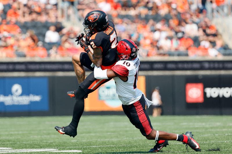 Sep 16, 2023; Corvallis, Oregon, USA; Oregon State Beavers wide receiver Anthony Gould (2) catches a pass while being defended by San Diego State Aztecs corner back Noah Tumblin (10) during the first half at Reser Stadium. Mandatory Credit: Soobum Im-USA TODAY Sports