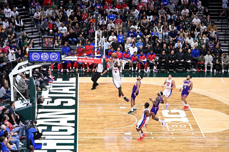 EAST LANSING, MI - OCTOBER 8: Jalen Duren #0 of the Detroit Pistons dunks the ball during the game against the Phoenix Suns during a NBA Preseason game on October 8, 2024 at the Breslin Center in East Lansing, Michigan. NOTE TO USER: User expressly acknowledges and agrees that, by downloading and/or using this photograph, User is consenting to the terms and conditions of the Getty Images License Agreement. Mandatory Copyright Notice: Copyright 2024 NBAE (Photo by Chris Schwegler/NBAE via Getty Images)