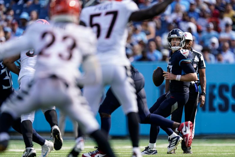 Tennessee Titans quarterback Ryan Tannehill (17) looks to pass against the Cincinnati Bengals during the second half of an NFL football game, Sunday, Oct. 1, 2023, in Nashville, Tenn. (AP Photo/George Walker IV)