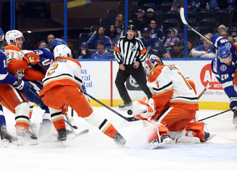 Jan 16, 2025; Tampa, Florida, USA; Tampa Bay Lightning right wing Cam Atkinson (13) shoots as Anaheim Ducks goaltender Lukas Dostal (1) defends during the first period at Amalie Arena. Mandatory Credit: Kim Klement Neitzel-Imagn Images