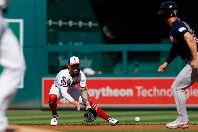 Aug 17, 2023; Washington, District of Columbia, USA; Washington Nationals second baseman Michael Chavis (6) fields a ground ball hit by Boston Red Sox third baseman Rafael Devers (not pictured) in front of Red Sox left fielder Rob Refsnyder (30) during the first inning at Nationals Park. Mandatory Credit: Geoff Burke-USA TODAY Sports
