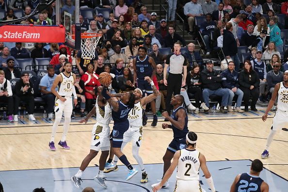 MEMPHIS, TN - DECEMBER 21: Ja Morant #12 of the Memphis Grizzlies shoots the ball during the game against the Indiana Pacers on December 21, 2023 at FedExForum in Memphis, Tennessee. NOTE TO USER: User expressly acknowledges and agrees that, by downloading and or using this photograph, User is consenting to the terms and conditions of the Getty Images License Agreement. Mandatory Copyright Notice: Copyright 2023 NBAE (Photo by Joe Murphy/NBAE via Getty Images)