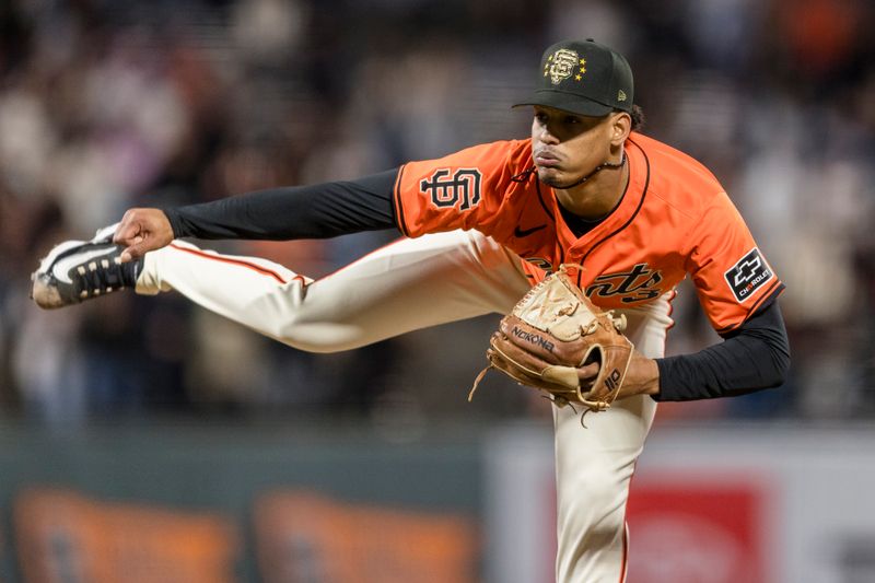 May 17, 2024; San Francisco, California, USA; San Francisco Giants closing pitcher Randy Rodríguez (73) throws against the Colorado Rockies during the ninth inning at Oracle Park. Mandatory Credit: John Hefti-USA TODAY Sports