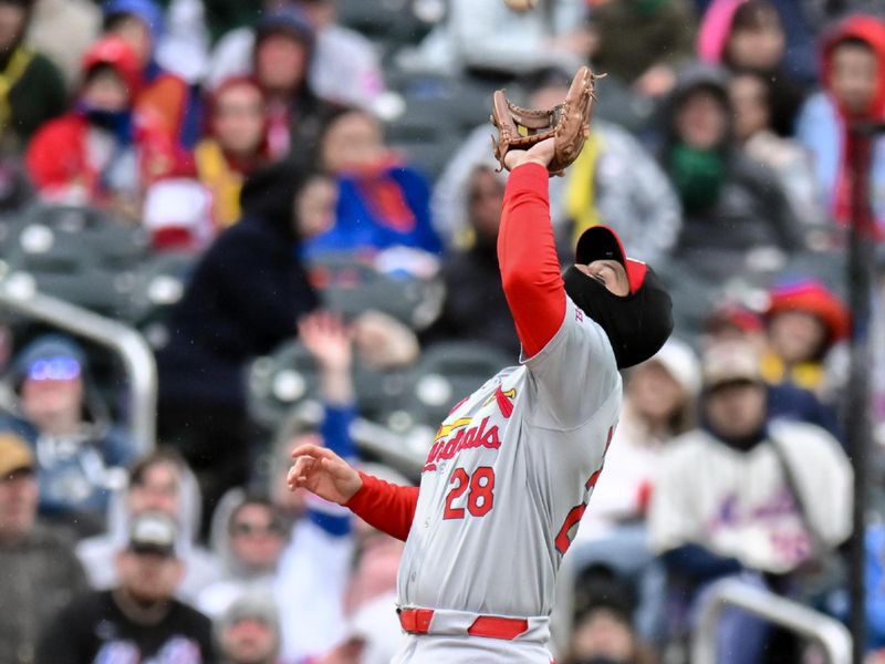 Apr 27, 2024; New York City, New York, USA; St. Louis Cardinals third baseman Nolan Arenado (28) catches a pop fly for an out during the sixth inning against the New York Mets at Citi Field. Mandatory Credit: John Jones-USA TODAY Sports