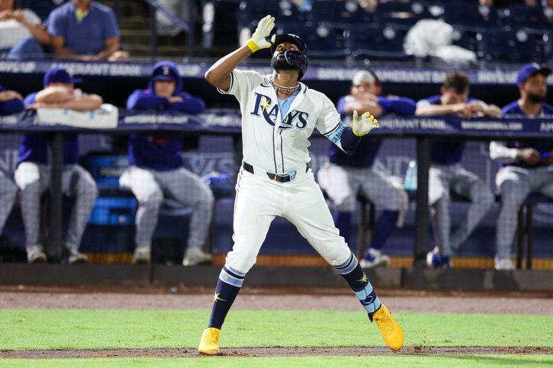 Jun 3, 2025; Tampa, Florida, USA; Tampa Bay Rays third baseman Junior Caminero (13) runs the bases after hitting a solo home run against the Texas Rangers in the eighth inning at George M. Steinbrenner Field. Mandatory Credit: Nathan Ray Seebeck-Imagn Images