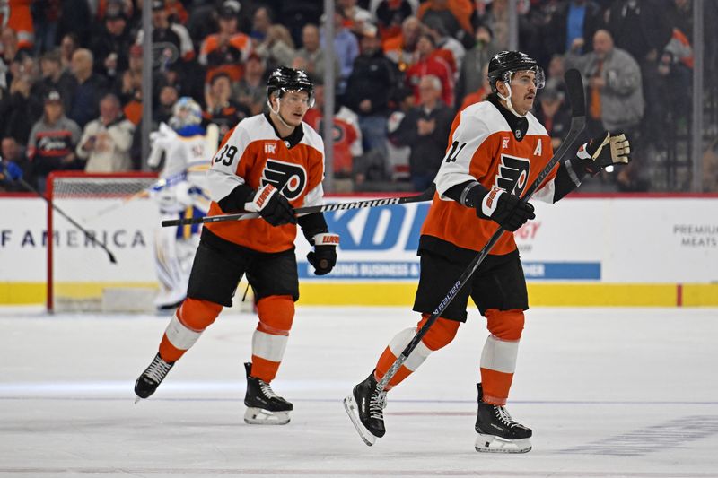 Dec 3, 2025; Philadelphia, Pennsylvania, USA; Philadelphia Flyers right wing Travis Konecny (11) celebrates his goal against the Buffalo Sabres during the first period at Xfinity Mobile Arena. Mandatory Credit: Eric Hartline-Imagn Images
