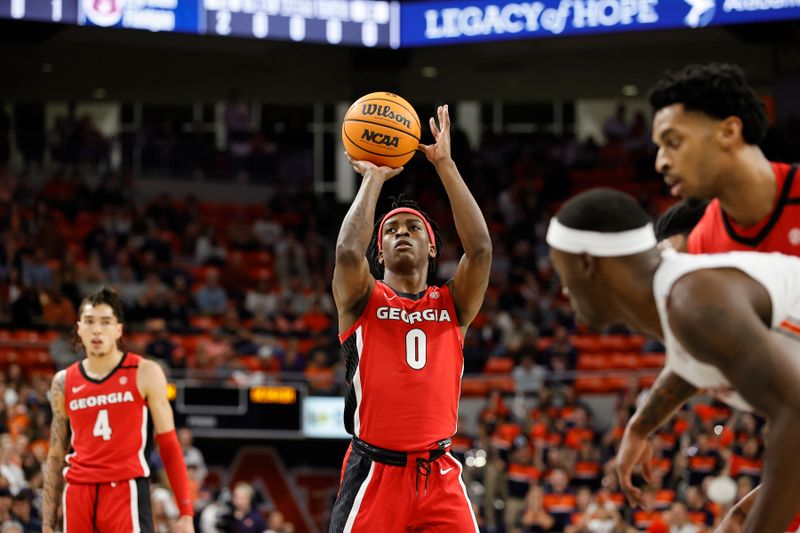 Feb 1, 2023; Auburn, Alabama, USA;  Georgia Bulldogs guard Terry Roberts (0) shoots a free throw against the Auburn Tigers during the first half at Neville Arena. Mandatory Credit: John Reed-USA TODAY Sports