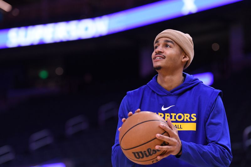 SAN FRANCISCO, CA - DECEMBER 3: Jordan Poole #3 of the Golden State Warriors smiles during warm ups before the game against the Houston Rockets on December 3, 2022 at Chase Center in San Francisco, California. NOTE TO USER: User expressly acknowledges and agrees that, by downloading and or using this photograph, user is consenting to the terms and conditions of Getty Images License Agreement. Mandatory Copyright Notice: Copyright 2022 NBAE (Photo by Noah Graham/NBAE via Getty Images)