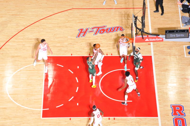 HOUSTON, TX - JANUARY 6: Damian Lillard #0 of the Milwaukee Bucks shoots the ball during the game against the Houston Rockets on January 6, 2024 at the Toyota Center in Houston, Texas. NOTE TO USER: User expressly acknowledges and agrees that, by downloading and or using this photograph, User is consenting to the terms and conditions of the Getty Images License Agreement. Mandatory Copyright Notice: Copyright 2024 NBAE (Photo by Logan Riely/NBAE via Getty Images)