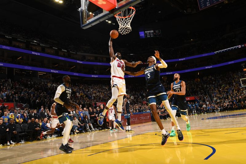 SAN FRANCISCO, CA - DECEMBER 8: Draymond Green #23 of the Golden State Warriors dunks the ball during the game against the Minnesota Timberwolves during a regular season game on December 8, 2024 at Chase Center in San Francisco, California. NOTE TO USER: User expressly acknowledges and agrees that, by downloading and or using this photograph, user is consenting to the terms and conditions of Getty Images License Agreement. Mandatory Copyright Notice: Copyright 2024 NBAE (Photo by Noah Graham/NBAE via Getty Images)