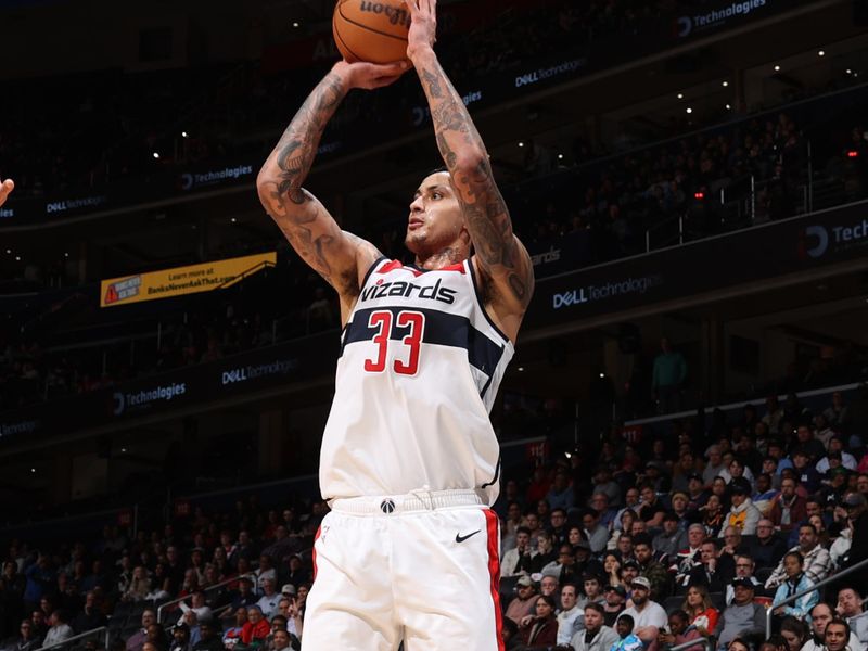 WASHINGTON, DC -? JANUARY 25: Kyle Kuzma #33 of the Washington Wizards shoots a three point basket during the game against the Utah Jazz on January 25, 2024 at Capital One Arena in Washington, DC. NOTE TO USER: User expressly acknowledges and agrees that, by downloading and or using this Photograph, user is consenting to the terms and conditions of the Getty Images License Agreement. Mandatory Copyright Notice: Copyright 2024 NBAE (Photo by Stephen Gosling/NBAE via Getty Images)
