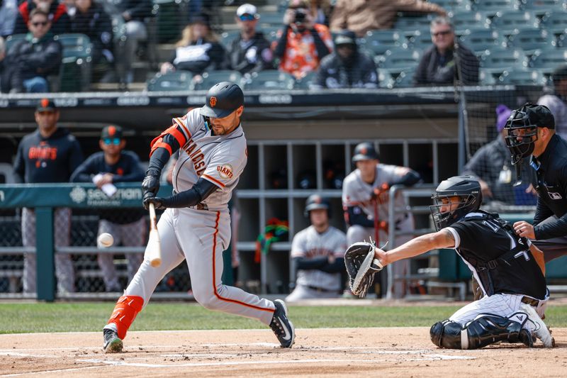 Apr 6, 2023; Chicago, Illinois, USA; San Francisco Giants right fielder Michael Conforto (8) hits a three-run home run against the Chicago White Sox during the first inning at Guaranteed Rate Field. Mandatory Credit: Kamil Krzaczynski-USA TODAY Sports