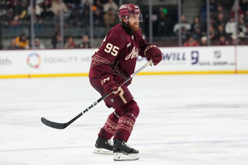 Mar 24, 2024; Tempe, Arizona, USA; Arizona Coyotes defenseman Cameron Crotty (95) skates against the Dallas Stars during the second period at Mullett Arena. It was the first game of the career of Crotty. Mandatory Credit: Joe Camporeale-USA TODAY Sports