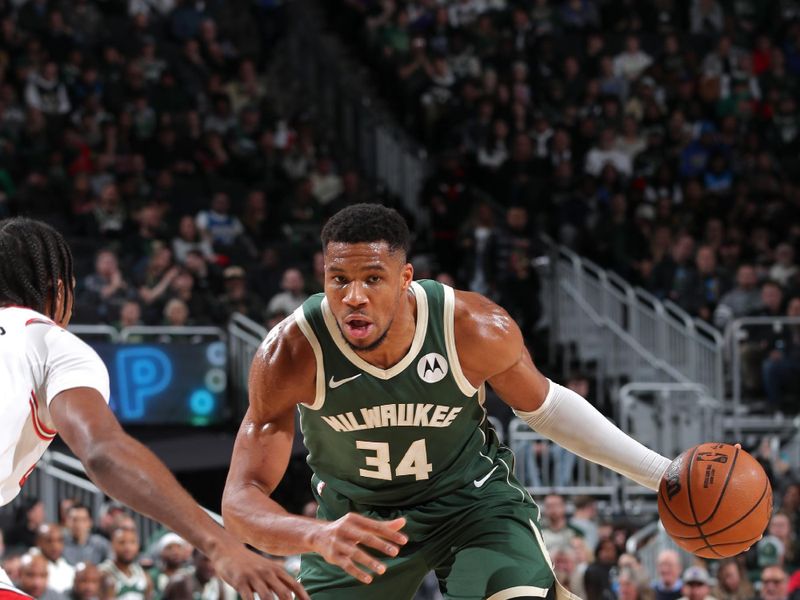 MILWAUKEE, WI - NOVEMBER 20: Giannis Antetokounmpo #34 of the Milwaukee Bucks handles the ball during the game against the Chicago Bulls on November 20, 2024 at the Fiserv Forum Center in Milwaukee, Wisconsin. NOTE TO USER: User expressly acknowledges and agrees that, by downloading and or using this Photograph, user is consenting to the terms and conditions of the Getty Images License Agreement. Mandatory Copyright Notice: Copyright 2024 NBAE (Photo by Gary Dineen/NBAE via Getty Images).