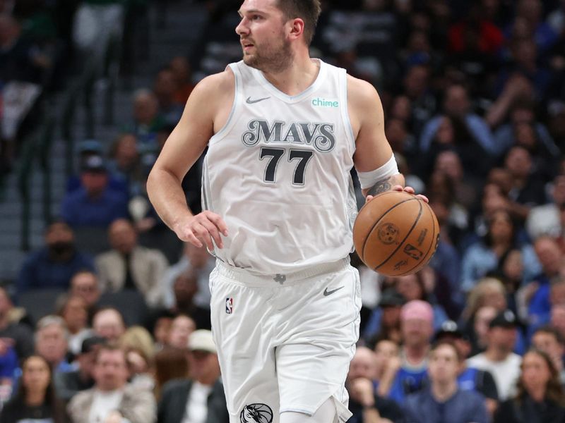 DALLAS, TX - NOVEMBER 16: Luka Doncic #77 of the Dallas Mavericks dribbles the ball during the game against the San Antonio Spurs on November 16, 2024 at American Airlines Center in Dallas, Texas. NOTE TO USER: User expressly acknowledges and agrees that, by downloading and or using this photograph, User is consenting to the terms and conditions of the Getty Images License Agreement. Mandatory Copyright Notice: Copyright 2024 NBAE (Photo by Tim Heitman/NBAE via Getty Images)