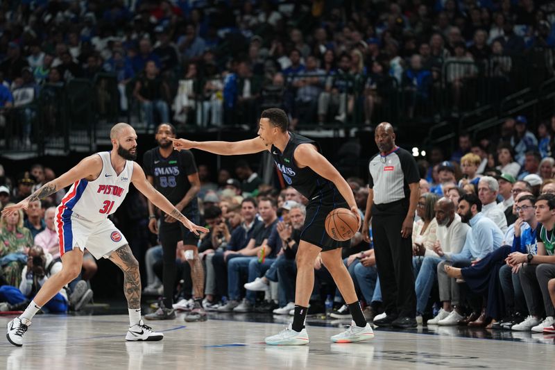 DALLAS, TX - APRIL 12: Dante Exum #0 of the Dallas Mavericks sets the play during the game against the Detroit Pistons on April 12, 2024 at the American Airlines Center in Dallas, Texas. NOTE TO USER: User expressly acknowledges and agrees that, by downloading and or using this photograph, User is consenting to the terms and conditions of the Getty Images License Agreement. Mandatory Copyright Notice: Copyright 2024 NBAE (Photo by Glenn James/NBAE via Getty Images)