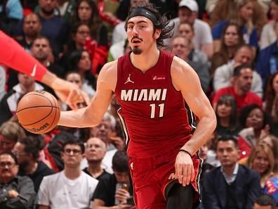 MIAMI, FL - DECEMBER 25:  Jaime Jaquez Jr. #11 of the Miami Heat handles the ball during the game  on December 25, 2023 at Kaseya Center Arena in Miami, Florida. NOTE TO USER: User expressly acknowledges and agrees that, by downloading and or using this Photograph, user is consenting to the terms and conditions of the Getty Images License Agreement. Mandatory Copyright Notice: Copyright 2023 NBAE (Photo by Issac Baldizon/NBAE via Getty Images)