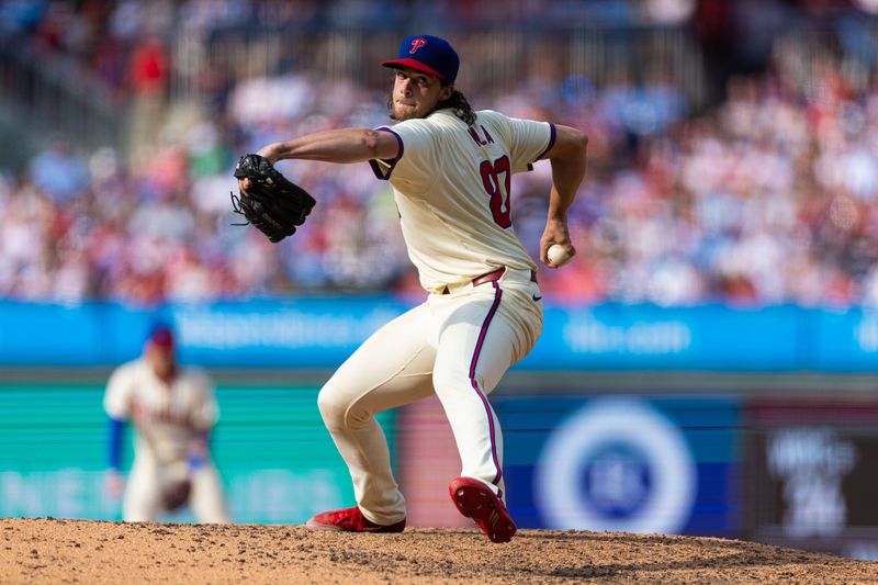 Jun 29, 2024; Philadelphia, Pennsylvania, USA; Philadelphia Phillies pitcher Aaron Nola (27) throws a pitch against the Miami Marlins at Citizens Bank Park. Mandatory Credit: Bill Streicher-USA TODAY Sports