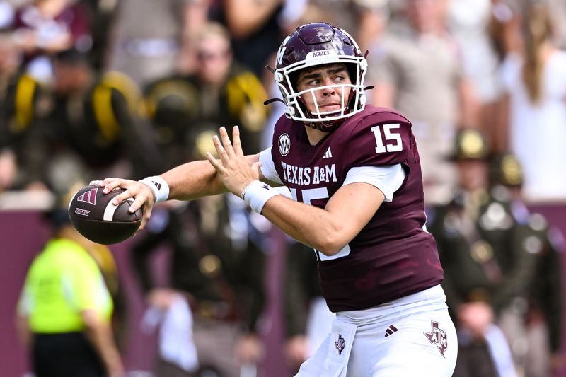 Sep 23, 2023; College Station, Texas, USA; Texas A&M Aggies quarterback Conner Weigman (15) looks to throw the ball during the second quarter against the Auburn Tigers at Kyle Field. Mandatory Credit: Maria Lysaker-USA TODAY Sports