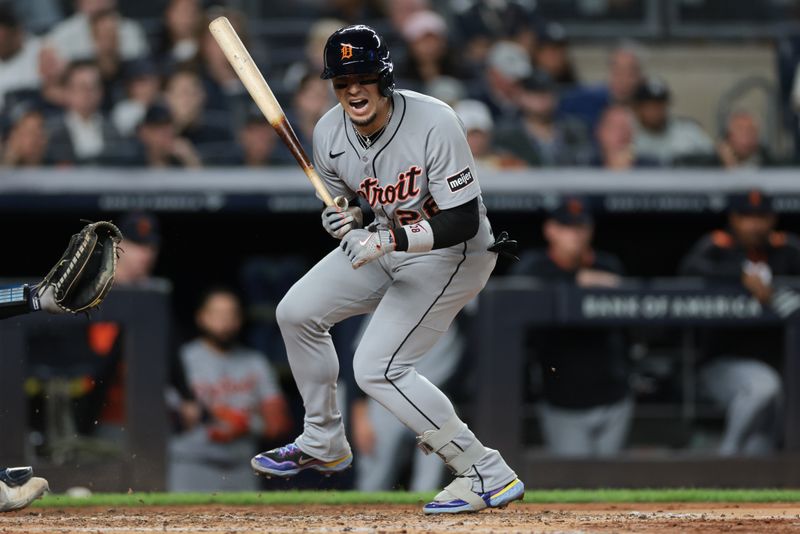 Sep 10, 2025; Bronx, New York, USA; Detroit Tigers center fielder Javier Baez (28) is hit by a pitch during the fifth inning against the New York Yankees at Yankee Stadium. Mandatory Credit: Vincent Carchietta-Imagn Images