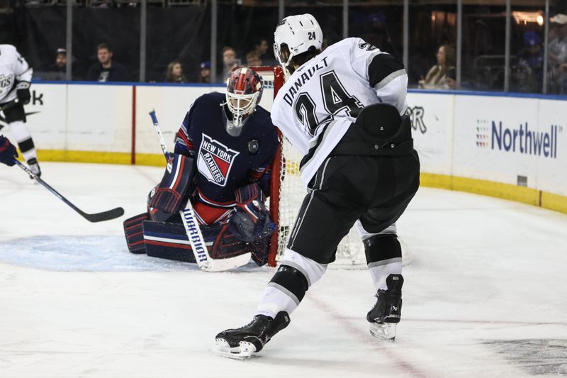 Dec 14, 2024; New York, New York, USA;  New York Rangers goaltender Igor Shesterkin (31) makes a save on a shot on goal attempt by Los Angeles Kings center Phillip Danault (24) in the first period at Madison Square Garden. Mandatory Credit: Wendell Cruz-Imagn Images