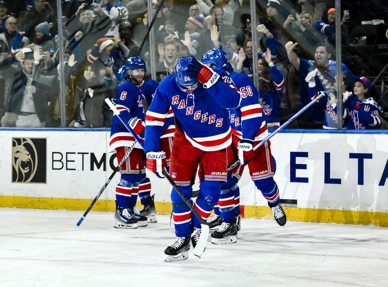 Nov 30, 2024; New York, New York, USA; New York Rangers right wing Kaapo Kakko (24) reacts after scoring a goal against the Montreal Canadiens during the third period at Madison Square Garden. Mandatory Credit: John Jones-Imagn Images