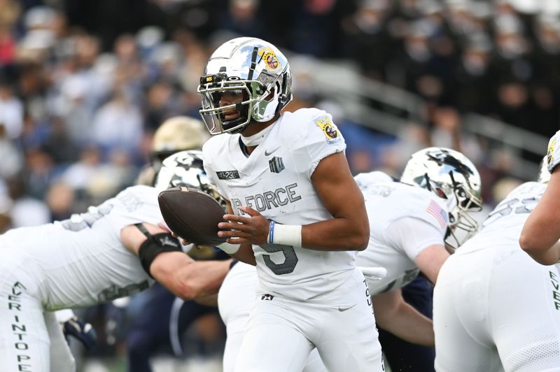 Oct 21, 2023; Annapolis, Maryland, USA;  Air Force Falcons quarterback Zac Larrier (9) drops back to the pocket during the second half against the Navy Midshipmen at Navy-Marine Corps Memorial Stadium. Mandatory Credit: Tommy Gilligan-USA TODAY Sports