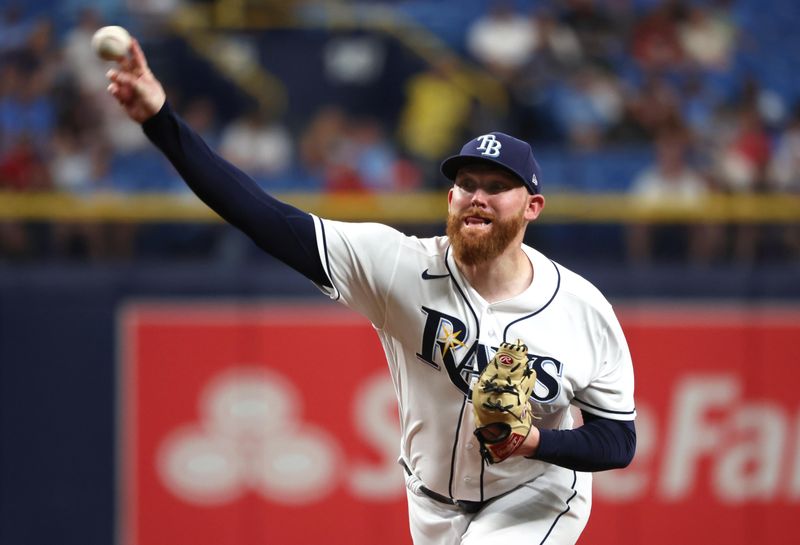 Aug 10, 2023; St. Petersburg, Florida, USA;  Tampa Bay Rays starting pitcher Zack Littell (52) throws a pitch during the second inning against the St. Louis Cardinals at Tropicana Field. Mandatory Credit: Kim Klement Neitzel-USA TODAY Sports