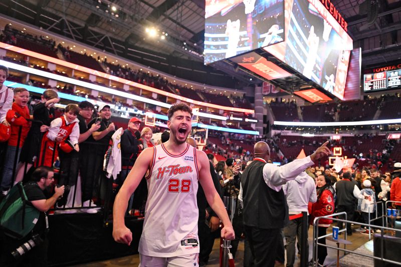 2HOUSTON, TX - JANUARY 20: Alperen Sengun #28 of the Houston Rockets celebrates after the game against the Utah Jazz on January 20, 2024 at the Toyota Center in Houston, Texas. NOTE TO USER: User expressly acknowledges and agrees that, by downloading and or using this photograph, User is consenting to the terms and conditions of the Getty Images License Agreement. Mandatory Copyright Notice: Copyright 2024 NBAE (Photo by Logan Riely/NBAE via Getty Images)