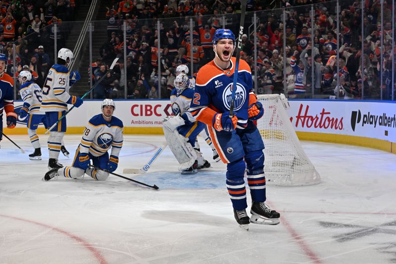 Dec 9, 2025; Edmonton, Alberta, CAN; Edmonton Oilers right winger Vasily Podkolzin (92) celebrates a goal on Buffalo Sabres goalie Alex Lyon (34) during the third period at Rogers Place. Mandatory Credit: Walter Tychnowicz-Imagn Images